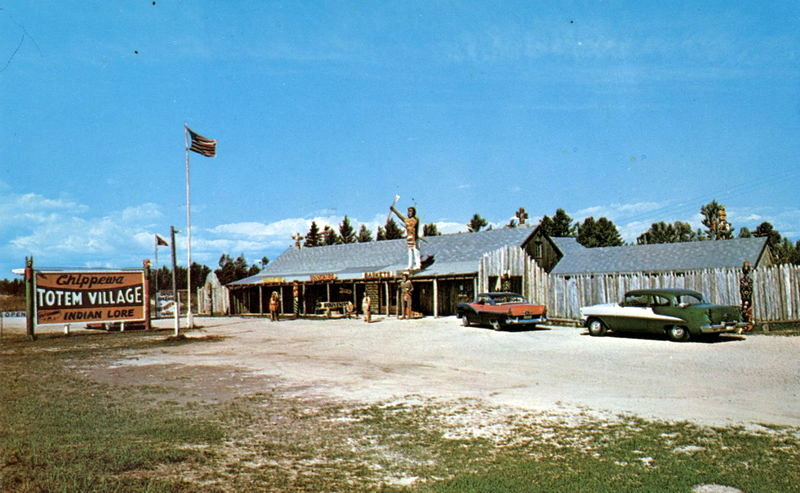 The Historic Totem Village (Chippewa Totem Village) - Vintage Postcard Back (newer photo)